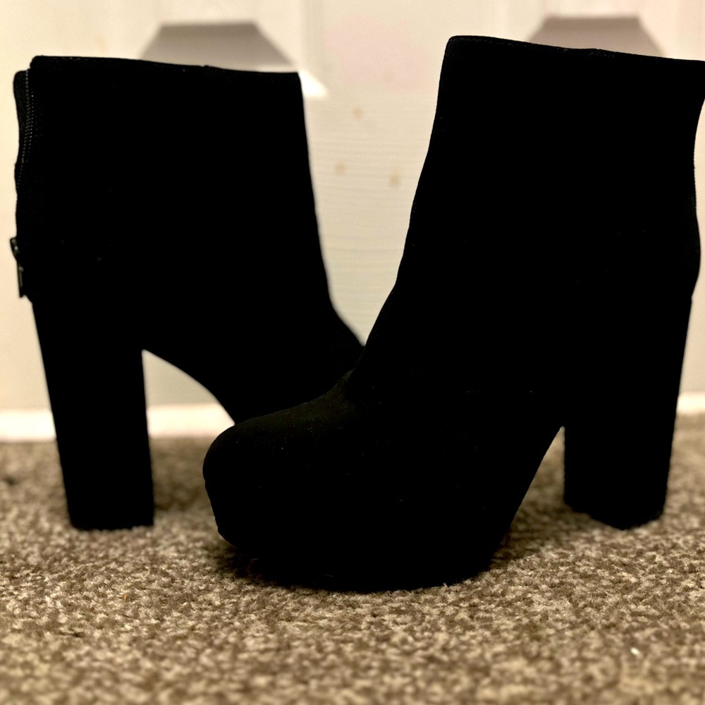 Black and suede above the ankle bootie